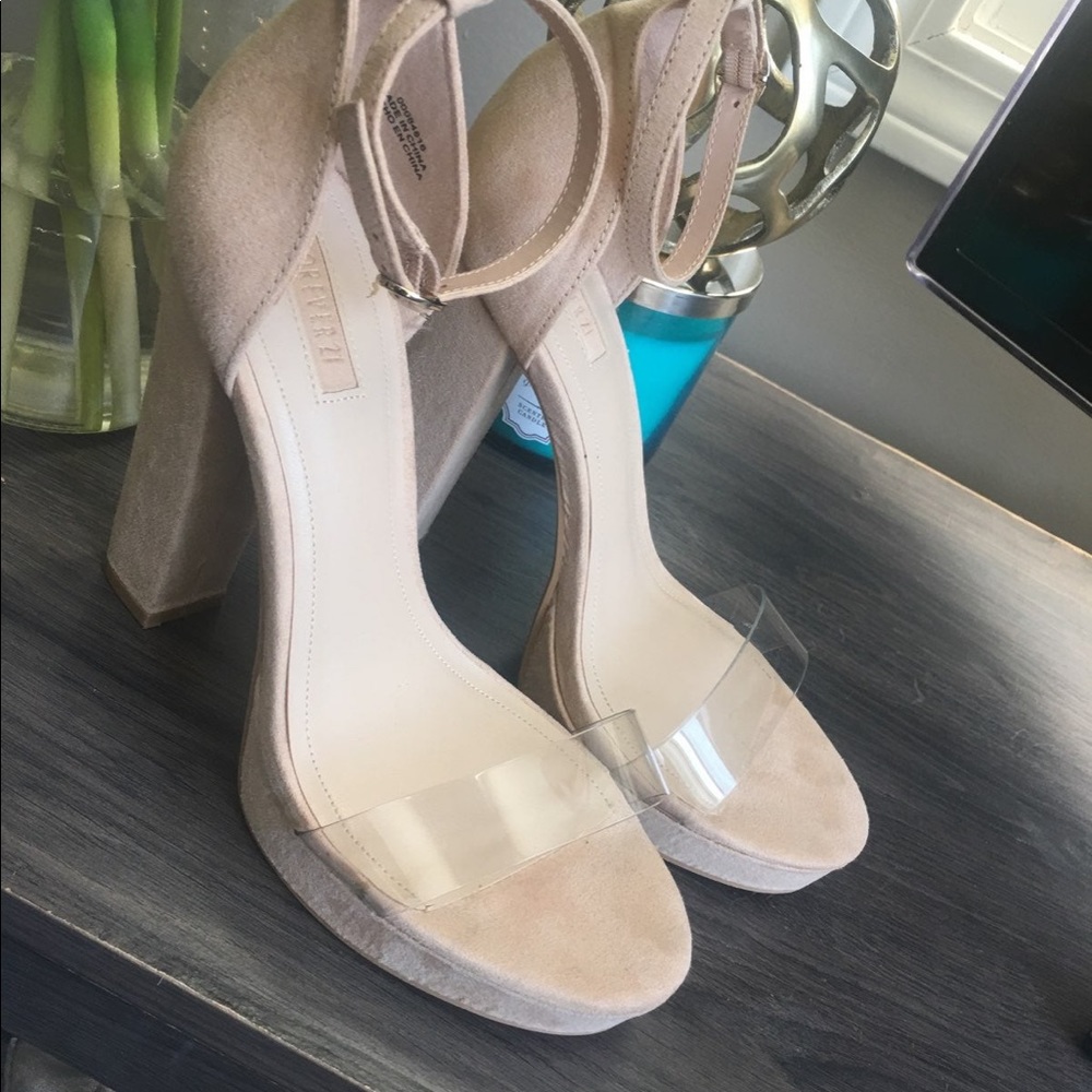 Nude heels with clear toe strap